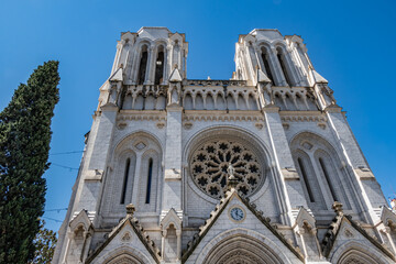 Roman Catholic Basilica of Notre Dame de Nice (Basilique de Notre-Dame-de-l'Assomption de Nice, 1864 -1868) on the Avenue Jean Medecin in the center of Nice. Nice, France. - 788795162