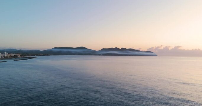 drone aerial from the city of calla millor at Mallorca at sunrise