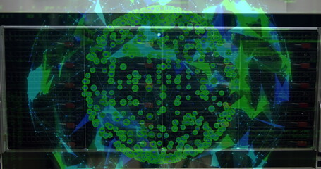 A person in a dark shirt stands behind a clear interface with green data points