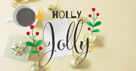 A card reading Holly Jolly surrounded by Christmas decorations - 788804599