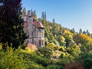 Landscape of Cragside estate during the colorful season of autumn