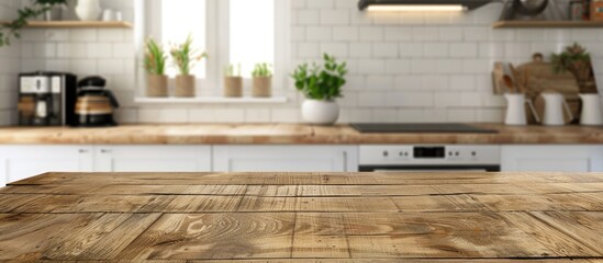 Table with empty space background and kitchen with blurred background.