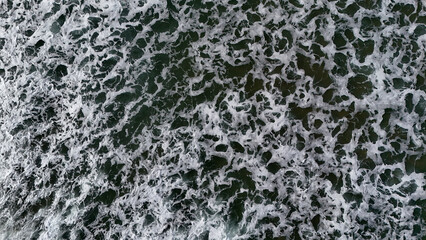 Aerial view to waves in ocean Splashing Waves. Blue clean wavy sea water