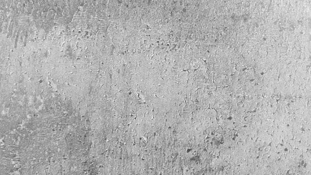 Closeup footage of an old gray concrete rough surface. Concrete surface background