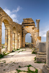 Fototapeta na wymiar Volubilis, Morocco - March 20, 2024: Touristic attraction and Roman archaeological site situated near Meknes. Volubilis, Morocco is a UNESCO World Heritage