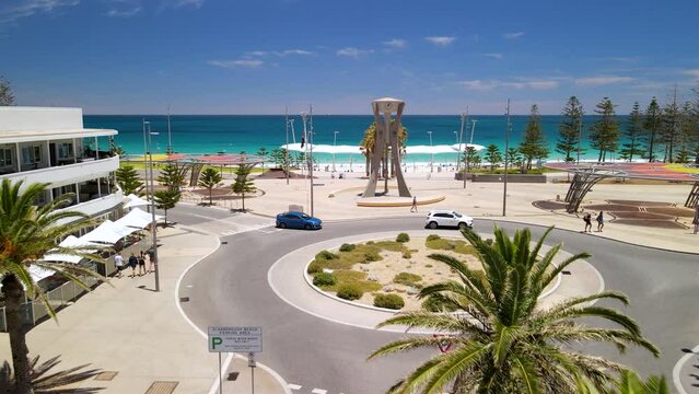 Drone shot of Scarborough Beach in Perth, showing the facilities and people swimming.
