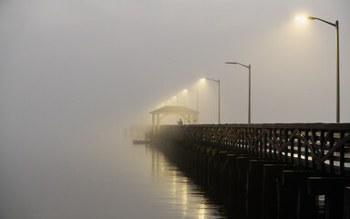 Foggy morning Ballast Point pier Tampa Florida, People fishing