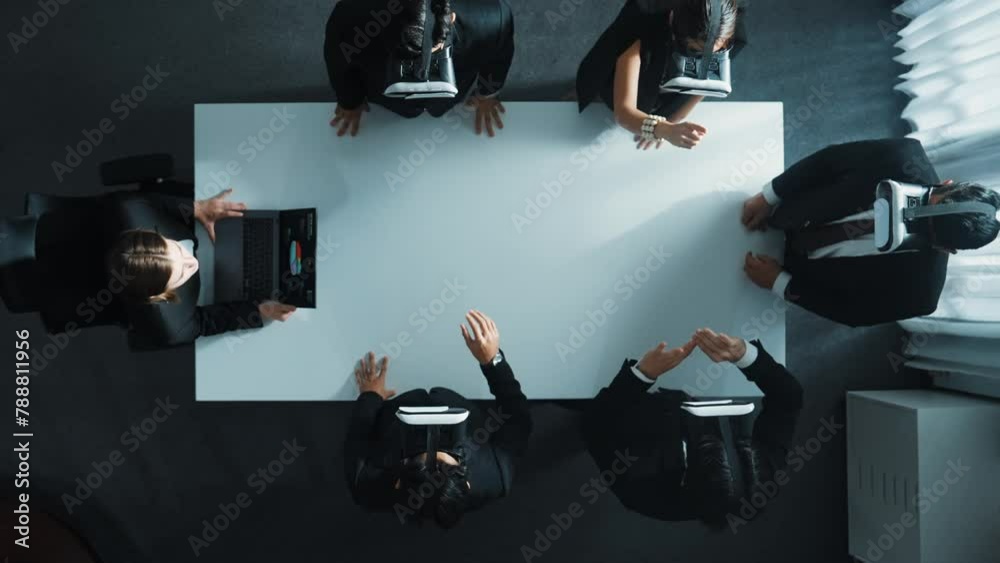Poster top down aerial view of diverse data analysts wearing vr headset and stand around table while using 