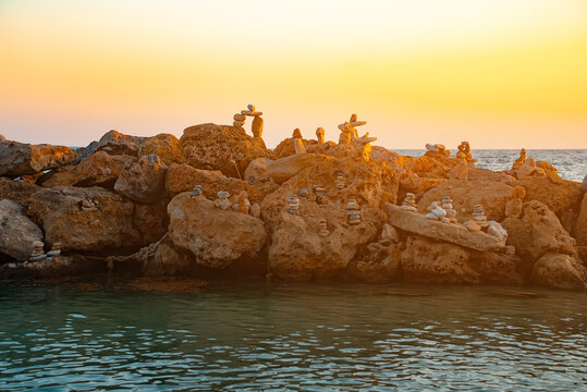 Many ZEN stones on the sunset beach.