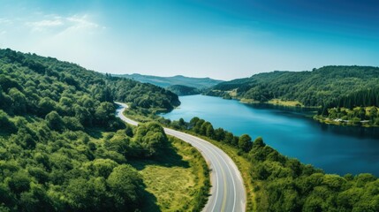 This is a beautiful landscape image of a road winding through a valley.