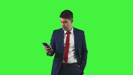 copyspace Businessman texting on smartphone green screen chroma key - Powered by Adobe