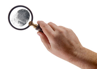 Male Hand Holding Magnifying Glass Viewing A Fingerprint on a White Background. - 788819542