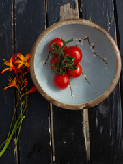 cherry tomatoes on a light blue bowl