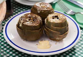 Outdoor kussens Steamed artichokes with alioli sauce. High quality photo © JackF