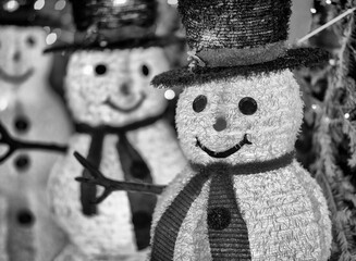 Snowman puppets at night in Dyker Heights, New York City - USA.