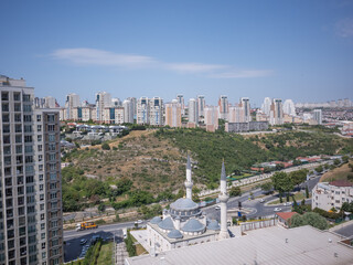 scenery of residential area with tall buildings and mosque in istanbul