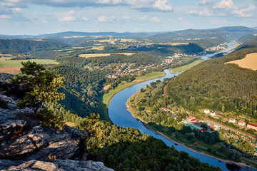 Fototapeta na wymiar aerial view of beautiful elbe river, forest and rocks in Bad Schandau, Germany