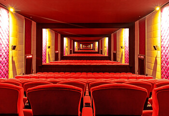 An empty movie theater with a infinitely projection an empty movie theater