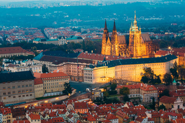Fototapeta na wymiar View of Prague, Czech Republic. Castle, St. Vitus Cathedral. Aerial view to Lesser Town, Prague castle and St. Nicholas church