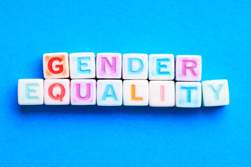 The image is a colorful arrangement of blocks that spell out the word gender equality.