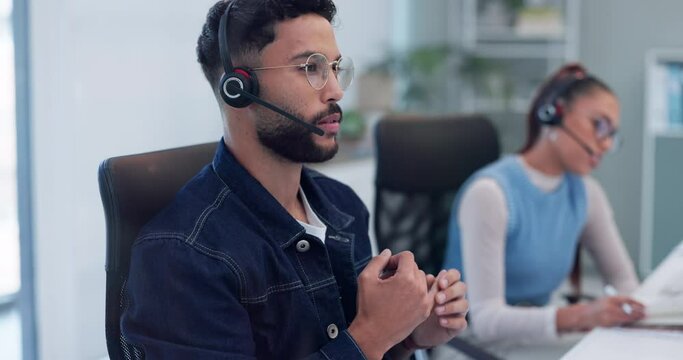 Headset, microphone and man for tech support in office, workspace and by staff working in call center for telemarketing career. Male person, talking and customer service representative or consultant