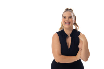 Caucasian young female plus size model laughing on white background, wearing black dress, copy space - 788839922