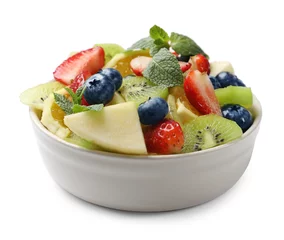 Gordijnen Tasty fruit salad in bowl isolated on white © New Africa