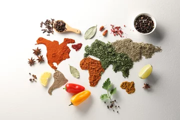 Plexiglas foto achterwand World map of different spices and products on white textured table, flat lay © New Africa