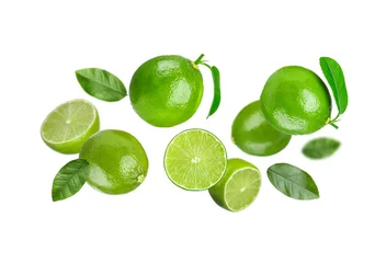 Foto op Aluminium Fresh ripe limes in air on white background © New Africa