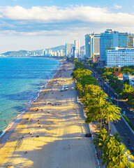 Nha Trang city seen from above in the afternoon with a beautiful stretch of clean sand attracts...
