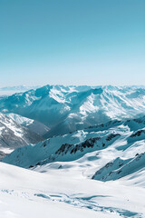 Breathtaking Winter Panoramic View: Majestic Snow-Covered Peaks of Pyrenees Mountains under Pristine Blue Sky
