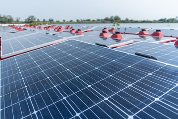 Floating solar panels on water lake. solar panels at sun light. clean energy for future living....