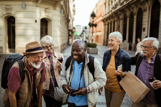 Diverse senior people exploring the city on vacation