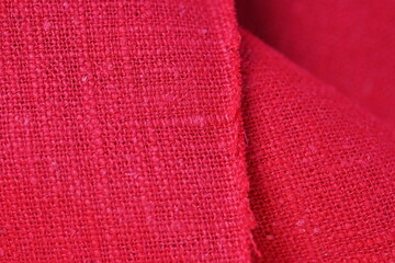 red hemp viscose natural fabric cloth color, sackcloth rough texture of textile fashion abstract background
