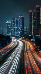 Fototapeta na wymiar Streaks of moving car lights against the backdrop of city lights at night