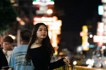 Asian Woman Solo Travel on Yaowarat Road Thailand