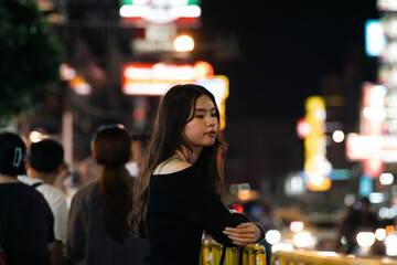 Asian Woman Solo Travel on Yaowarat Road Thailand