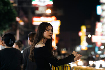 Asian Woman Solo Travel on Yaowarat Road Thailand