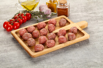 Uncooked raw beef meatball minced