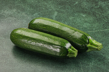 Raw green ripe zucchini vegetable