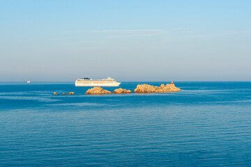 Cruise ship passes small off-shore islands off Croatian coast of Dubrovnik Croatia