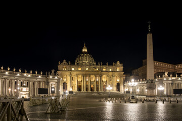 Fototapeta na wymiar Nighttime vista of Saint Peter's Square in Vatican City, the papal enclave in Rome, showcasing the iconic Vatican obelisk at its center, framed by the striking backdrop of St. Peter's Basilica.