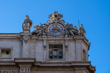 Architectural detail of Saint Peter's Basilica in Vatican City, the papal enclave in Rome, showcasing intricate design elements and structural features.
