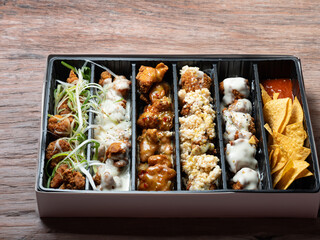 Various types of chicken in packaging containers
