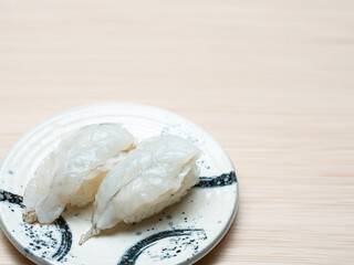 Raw shrimp sushi on plate