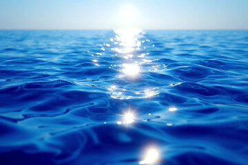 透き通った青い水面とキラキラと反射する太陽の光 - obrazy, fototapety, plakaty