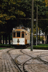 Street view with the famous retro tourist streetcar tram in the old town of Porto, Portugal....