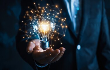 Businessperson Holding a Glowing Light Bulb With Digital Network Connections. - 788958348