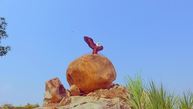 Sculpture of Jatayu (Eagle of Ramayana) with wings spread on huge rock at Lepakshi in Andhra Pradesh, India. Asia