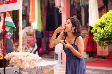Female Eating Pani Puri Delicious Indian Snack
